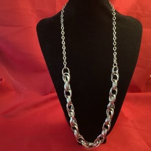 Long silver tone metallic necklace